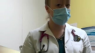 female doctor examining mamale exam